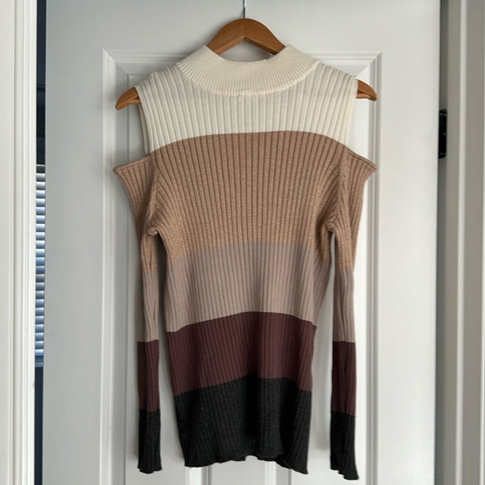 Chico’s multi color cold shoulder back zip sweater. Size 2